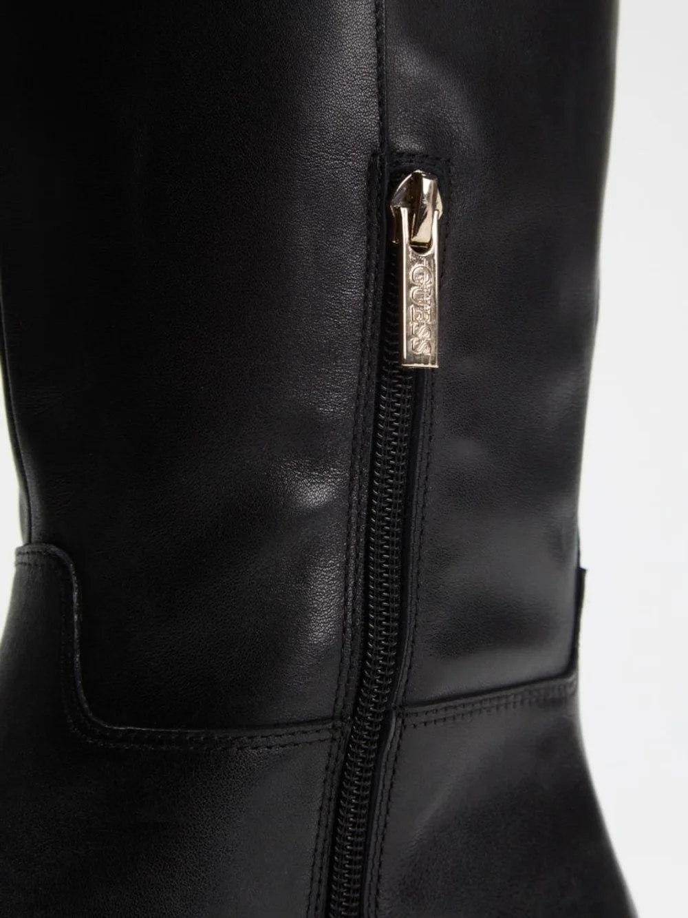 The GUESS Zoro riding boot is a beautiful silhouette Size 7m